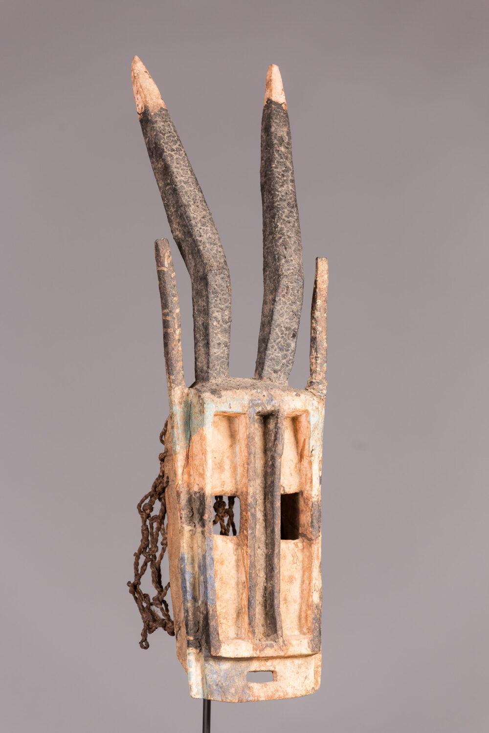 thumbnail of Mask made with wood, rope, pigment.