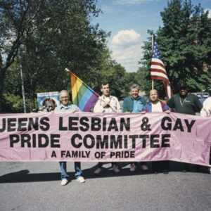 thumbnail of Photo of The Queens Lesbian & Gay Pride Committee prepares to march in the Queens Hispanic Parade in 1993