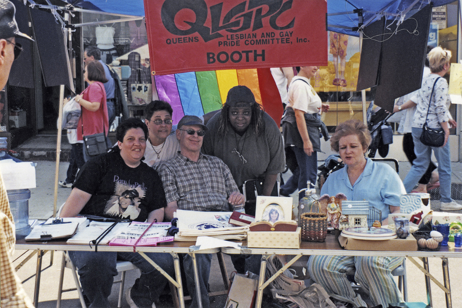 thumbnail of Photo of Members of the Queens Lesbian and Gay Pride Committee (QLGPC) at a street festival in Queens in 1993.
