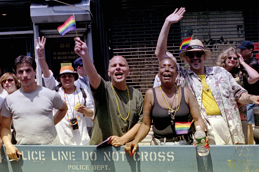 thumbnail of Photo of Paradegoers cheer at the 1999 Queens Pride Parade