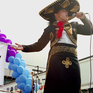 thumbnail of Photo of Qiamo, a Mexican singer, performs at the 1997 Queens Pride Parade Festival