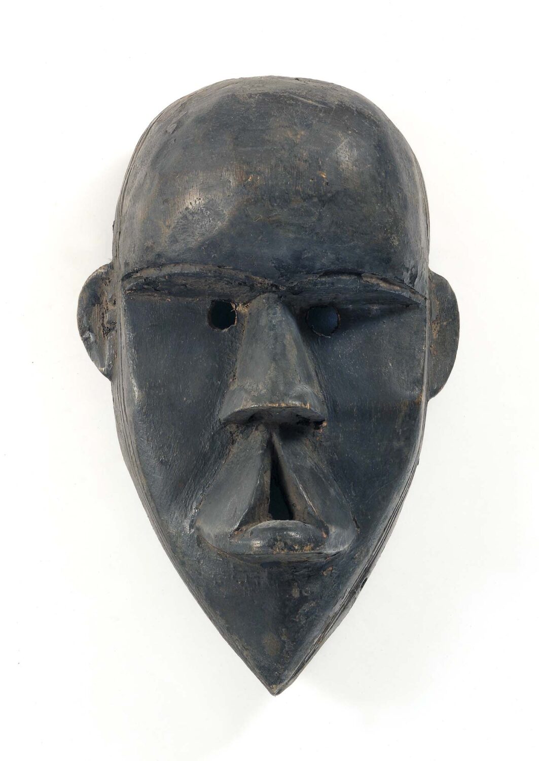 thumbnail of Mask showing cleft palate made with wood.