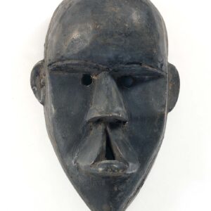 thumbnail of Mask showing cleft palate made with wood.