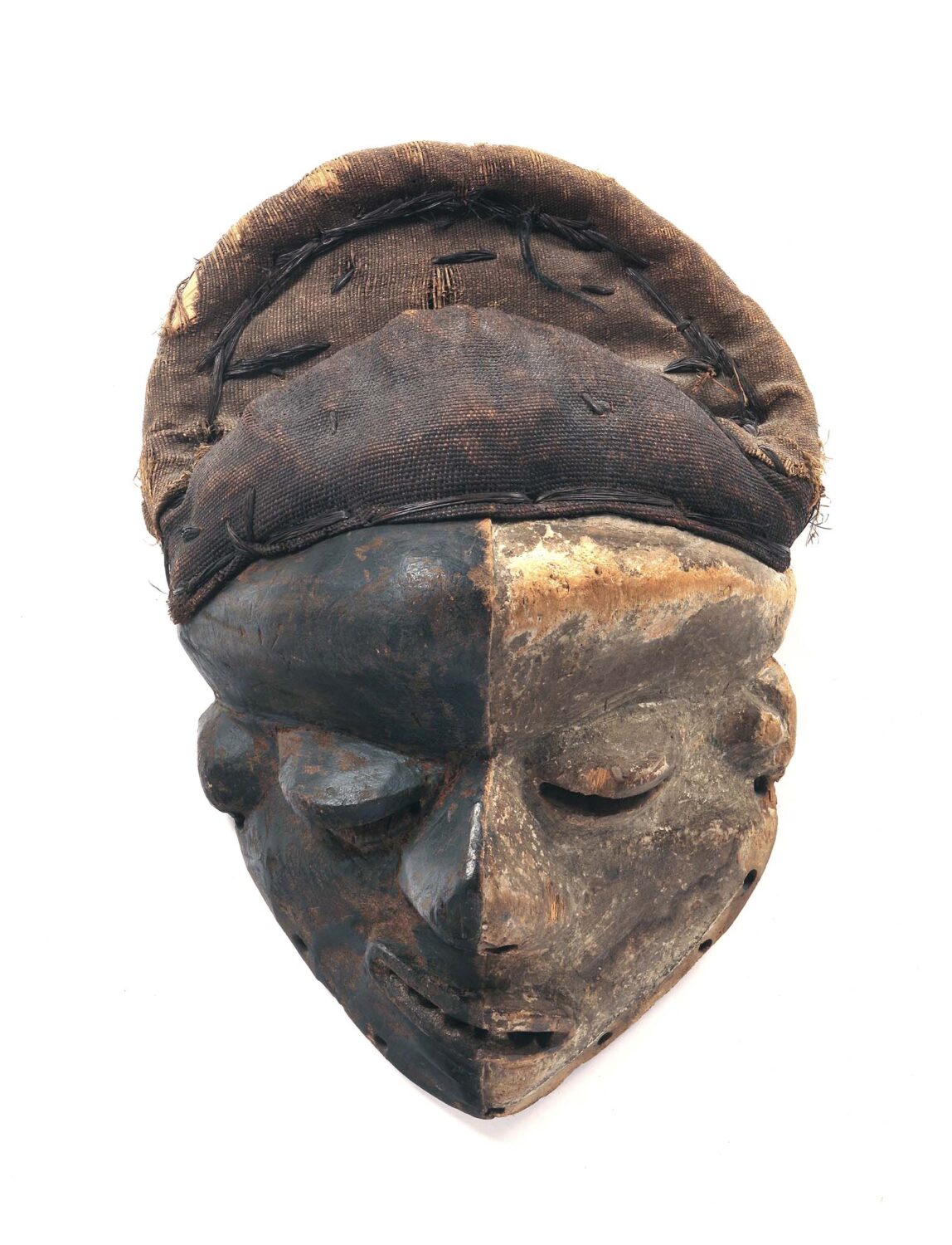 thumbnail of Mbangu mask made with wood, black pigment and kaolin.