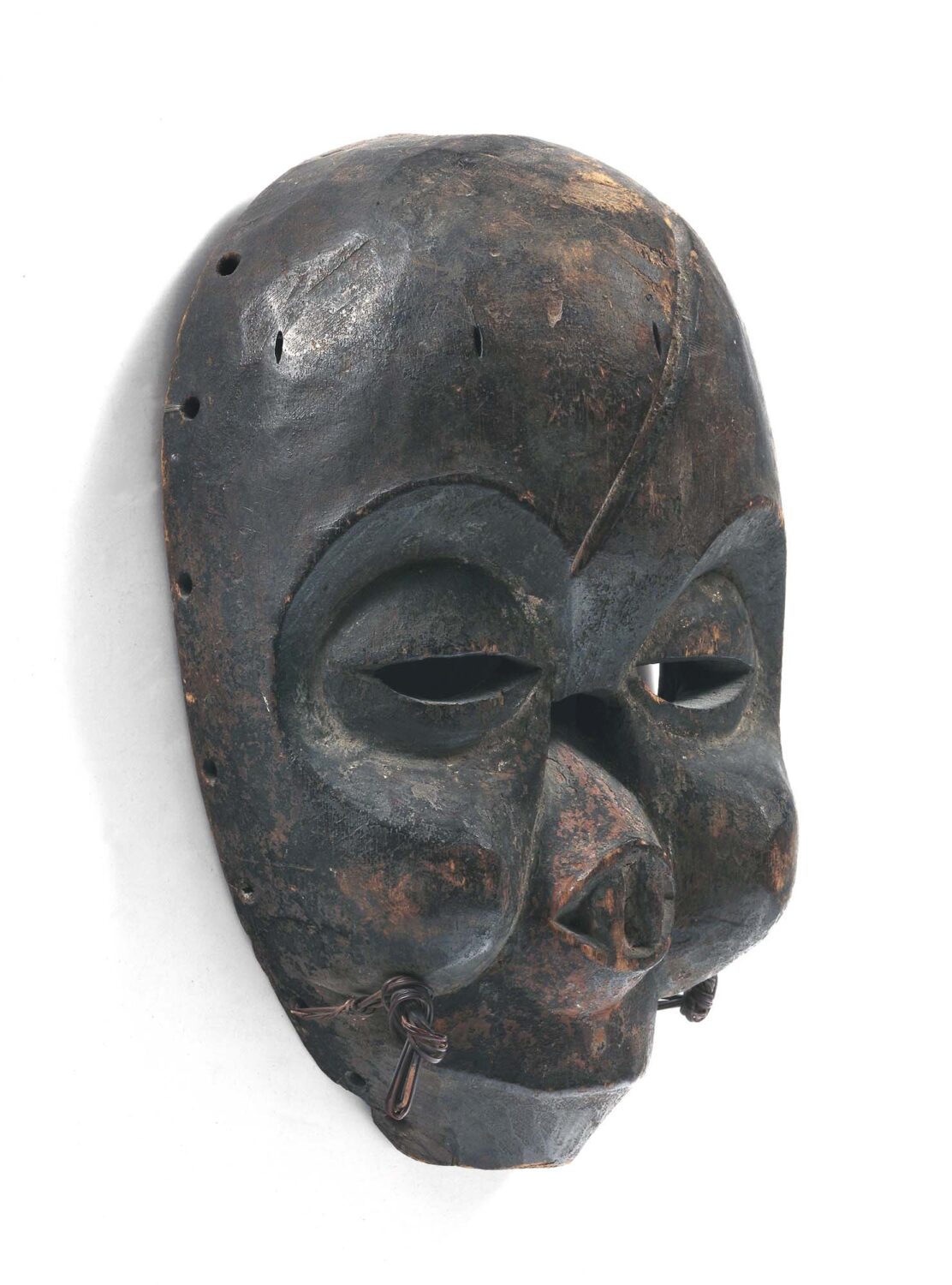 thumbnail of Ekpo Society mask with head slash, missing nose.