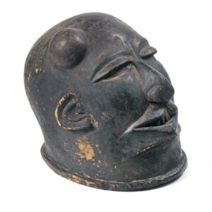 thumbnail of Helmet mask with cleft lip, bump on skull.