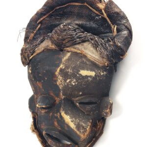 thumbnail of Tundu mask made with wood, pigment and textile.