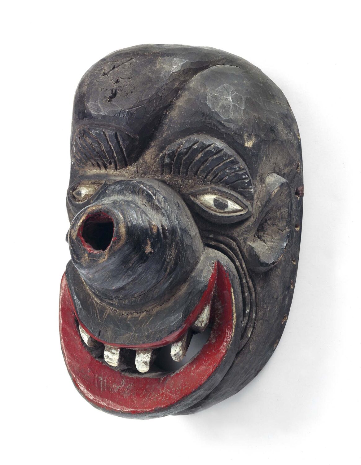thumbnail of Ekpo Society mask made with wood with black, red and white pigments.