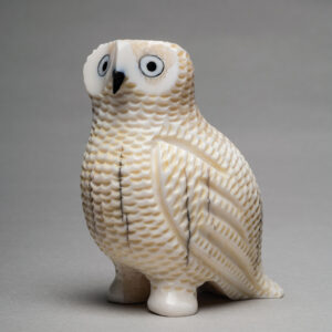 thumbnail of Sculpture made out of Walrus ivory, baleen beak and eyes, and ink by Malcom OozevaseukÂ titled Gambell, St. Lawrence Island Owl.