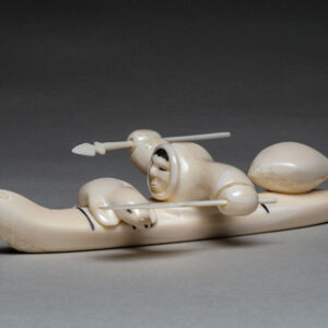 thumbnail of Sculpture made out of walrus ivory by Justin Tiulana titled King Island/ Anchorage Hunter.