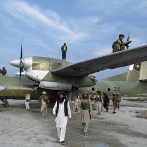 thumbnail of Afghan mujahideen inspect a Kabul government plane after they seized Khost