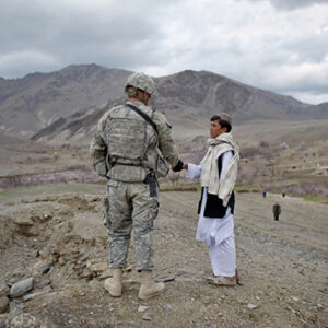 thumbnail of Soldier and civilian shaking hands