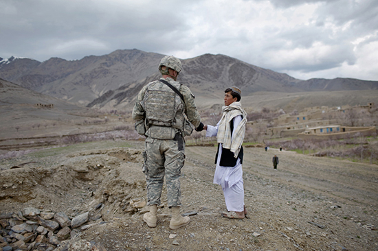thumbnail of Soldier and civilian shaking hands