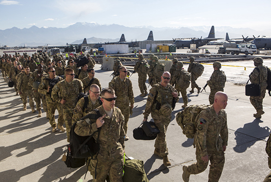 thumbnail of A contingent of American troops conclude their tour in Afghanistan and prepare to fly home