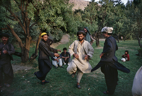 thumbnail of Afghan men perform the atan, a traditional Afghan dance