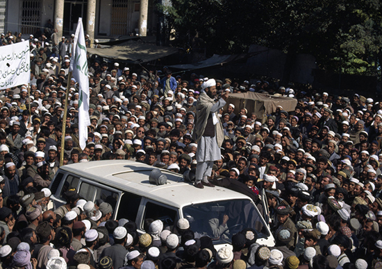 thumbnail of A Taliban mullah speaks to a crowd gathered in central Kabul