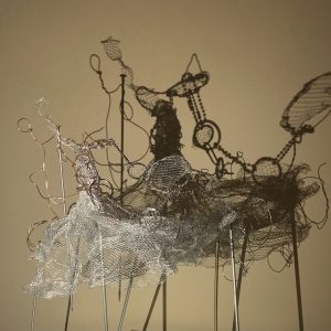 thumbnail of Untitled, modernist figure by Ambika Darnley. Medium: Wire, mesh and knitting needles. Size 11 x 9 x 4.5 inches Date 2020