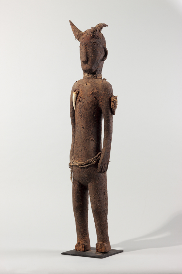 thumbnail of Male Figure from Ivory Coast/Burkin Faso/Ghana. medium: wood, horns, encrustation. dimensions: height of 35 inches