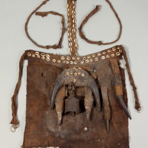 thumbnail of Accessory to Ritual Costume from maybe Toma, Guinea. medium: woven raffia, horns, cowries, bells, horns. dimensions: height of 16 inches. date: unknown