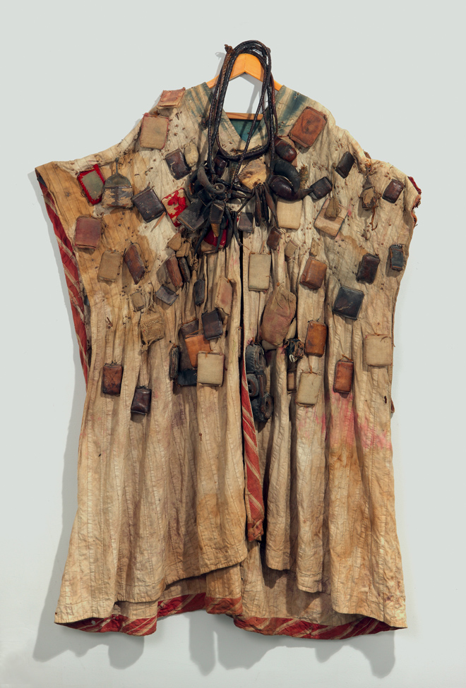 thumbnail of Cloak with Amulets from West Africa. medium: cotton, leather packets. dimensions: height of 50 inches. date: unknown