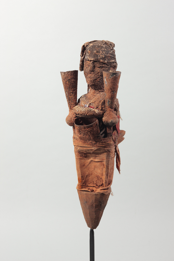thumbnail of Bocio Figure Holding Metal Cones from Republic of Benin. medium: Wood, iron, red, white and black pigment. dimensions: height of 20 inches. date: unknown