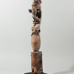 thumbnail of Bocio pair from Republic of Benin. medium: Wood, metal, bottle, binding, white pigment. dimensions: male has a height of 33 inches, female has a height of 30 inches. date: unknown