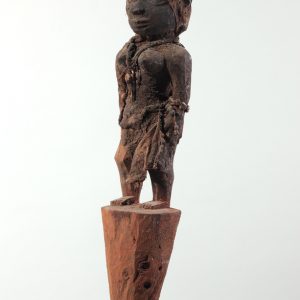 thumbnail of Bocio pair from Republic of Benin/Tago. medium: Wood, cloth, cowries, pigments. dimensions: male has a height of 22.5 inches, female has a height of 23 inches. date: unknown