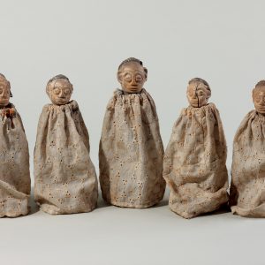 thumbnail of Figures in white eyelet from Ewe, Togo. medium: oiled wood, cotton. dimensions: height 7-9 inches. date: unknown