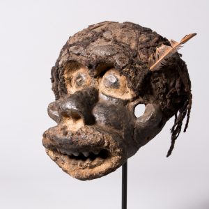 thumbnail of Male Leader Mask from Northwestern Grassfields: Oku. medium: Wood, human hair, pigment, feather, sap. date: mid-18th century