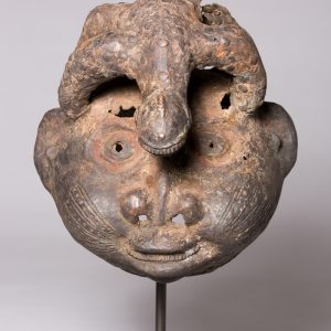 thumbnail of Helmet Mask from Western Grassfields: Bafanji. medium: Brass, copper, pigment. date: 18th century