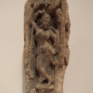 thumbnail of Yakshi Figure from Gandhara region. medium: Grey schist stone. date: 2nd century A.D.