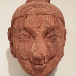 thumbnail of Head of Bodhisattva from Mathura region. medium: Red sandstone. date: 1st century A.D.