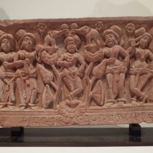thumbnail of Sucht Panel (from a Buddhist Vedika Stupa) from Mathura region. medium: Red sandstone. date: latter half of the 1st century B.C.