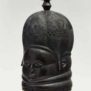 thumbnail of Helmet mask (sowei) from Mende, Sierra Leone. medium: wood, brown. dimensions: 13.5 x 8.5 inches
