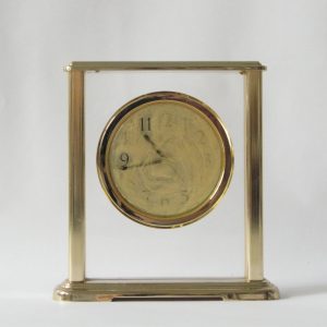 thumbnail of IXXI – Clock. medium: gold, clock. date: 2011. dimensions: 7 x 5 inches