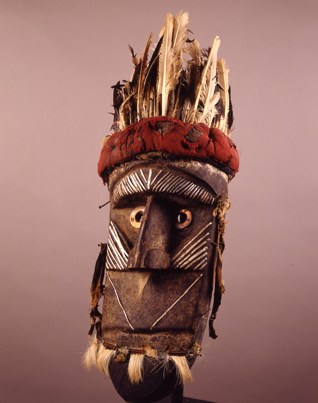 thumbnail of Poro Face Mask with metal strips from Toma, Liberia/Guinea. medium: wood and metal. date: unknown. height: 24 inches