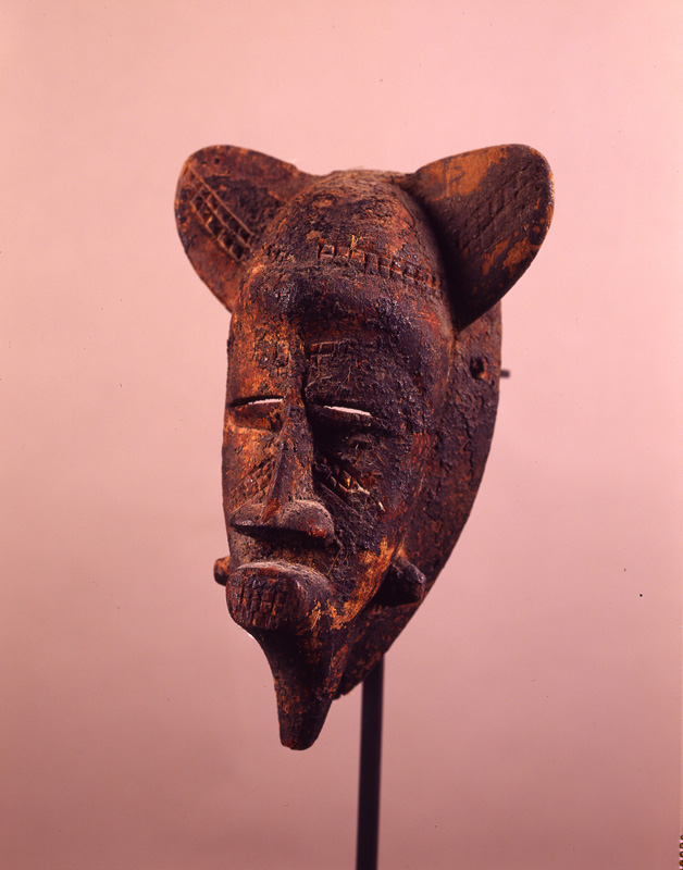thumbnail of Poro (Lo) Mask with lobed top from Senufo, Ivory Coast. medium: wood and blood. date: unknown. height: 8.5 inches