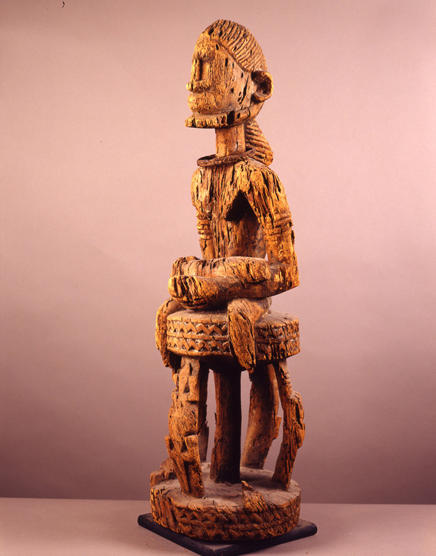 thumbnail of Seated Hogon Figure from Dogon, Mali. medium: wood. date: unknown dimensions: height: 34 inches