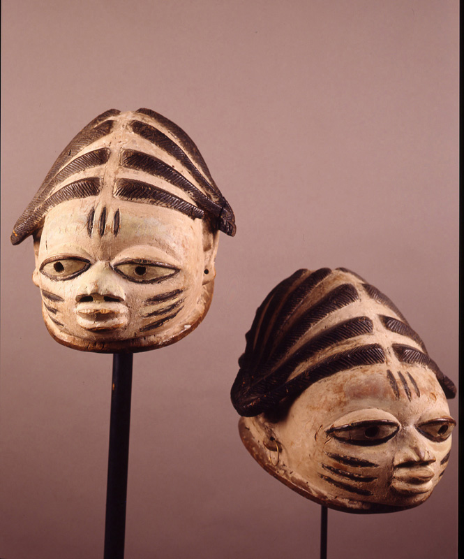 thumbnail of Pair of Gelede Masks from Yoruba, Nigeria. medium: wood. date: unknown. height: 11 inches