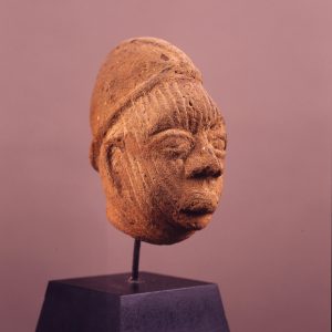 thumbnail of Head with incised lines from Ife, Nigeria. medium: terracotta. date: unknown. height: 4.5 inches