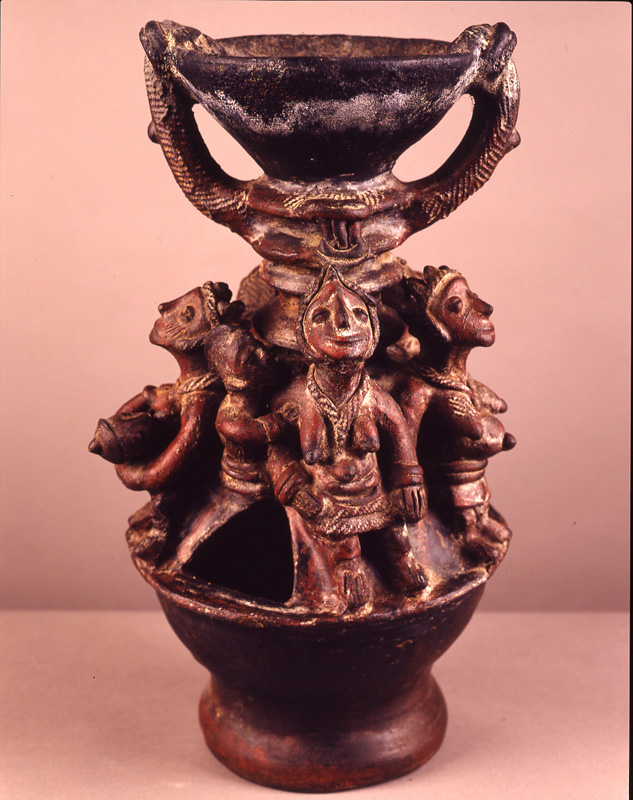 thumbnail of Oil Lamp with multiple figure from Baatombu (Beriba), Rep.o. medium: ceramic. date: unknown. height: 16 inches