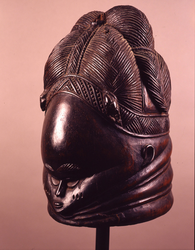 thumbnail of Sande Society Mask from Mende, Sierra Leone. medium: wood. date: unknown dimensions: height: 16 inches