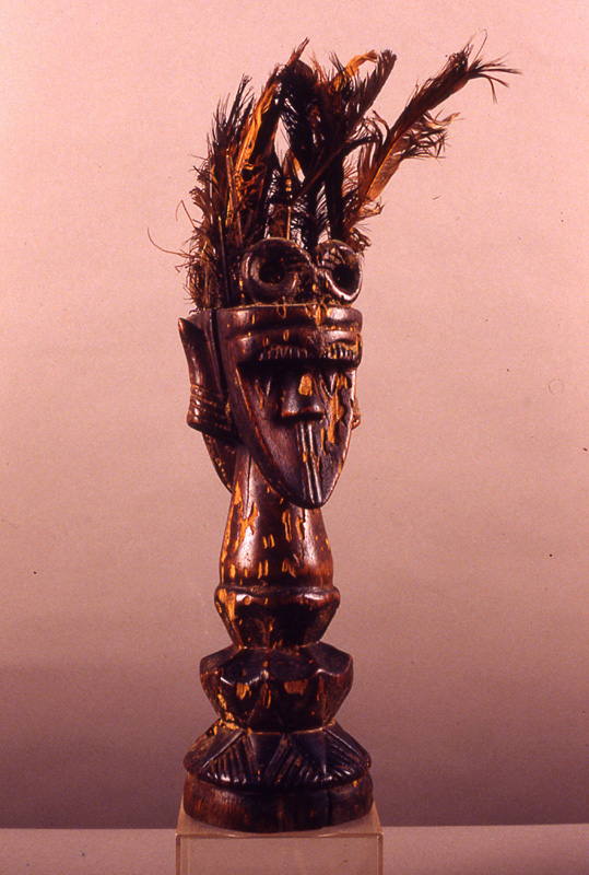 thumbnail of Janus Poro Staff from Toma, Liberia/Guinea. medium: wood and feathers. date: unknown. height: 14 inches