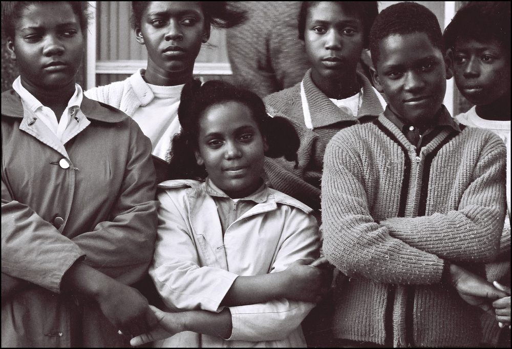 thumbnail of Quinta Harvel, Age 10 with teenage Voting Rights Demonstrators by Dan Budnik. medium: silver gelatin print. date: March, 1965. dimensions: 8.25 x 12 inches