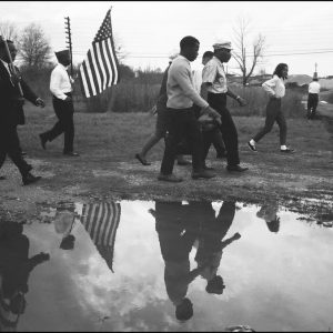 thumbnail of John Lewis and Martin Luther King Jr. Leading the Marchers by Dan Budnik. medium: silver gelatin print. date: March, 1965. dimensions: 8.25 x 12 inches
