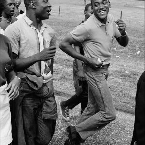 thumbnail of Leander Dudley, Right, singing with fellow marchers by Dan Budnik. medium: silver gelatin print. date: March 3, 1965. dimensions: 11.75x 7.875 inches
