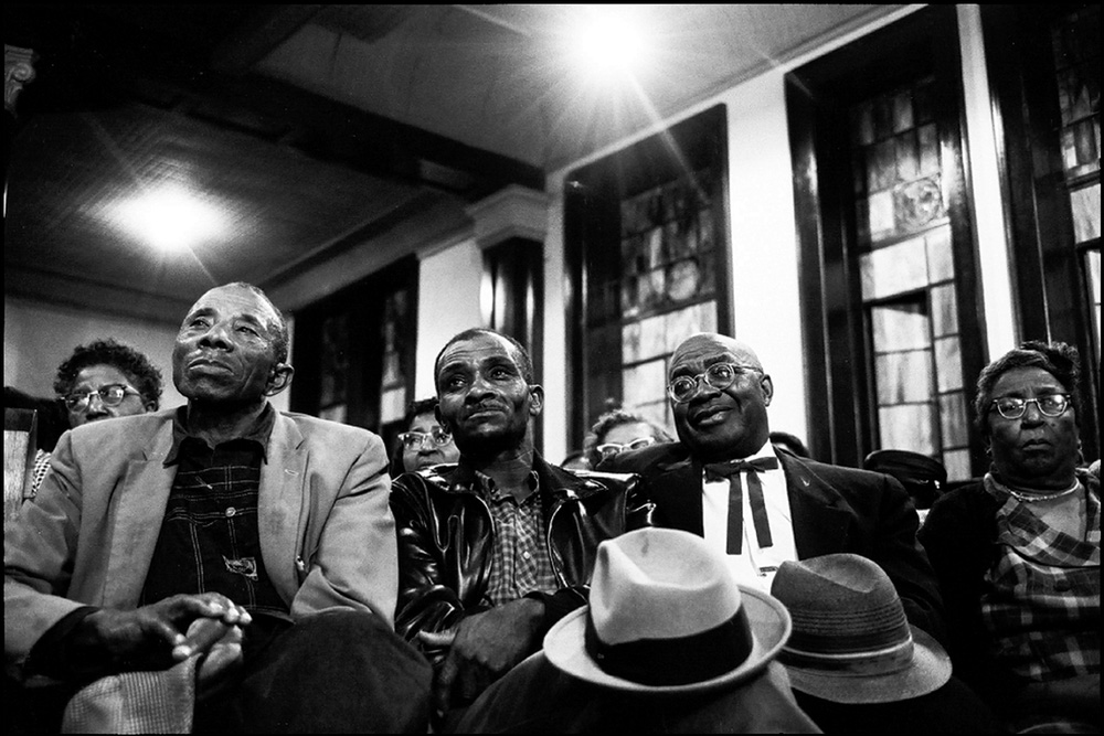 thumbnail of Congregation listening to Dr. King at Brown AME Church, Selma by Dan Budnik. medium: silver gelatin print. date: March, 1965. dimensions: 8.25 x 12.125 inches