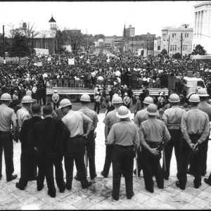 thumbnail of Alabama State Troopers guarding Dexter Ave. step to the state capitol, Montgomery by Dan Budnik. medium: silver gelatin print. date: March, 1965. dimensions: 7.75 x 11.75 inches
