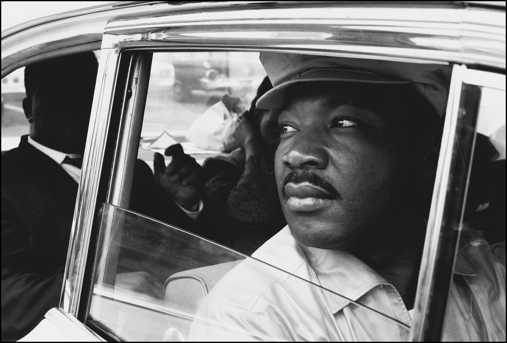thumbnail of Martin Luther King Jr. with his brother A.D. King at the Montgomery Municipal Airport by Dan Budnik. medium: silver gelatin print. date: March, 1965. dimensions: 11 x 16.5 inches
