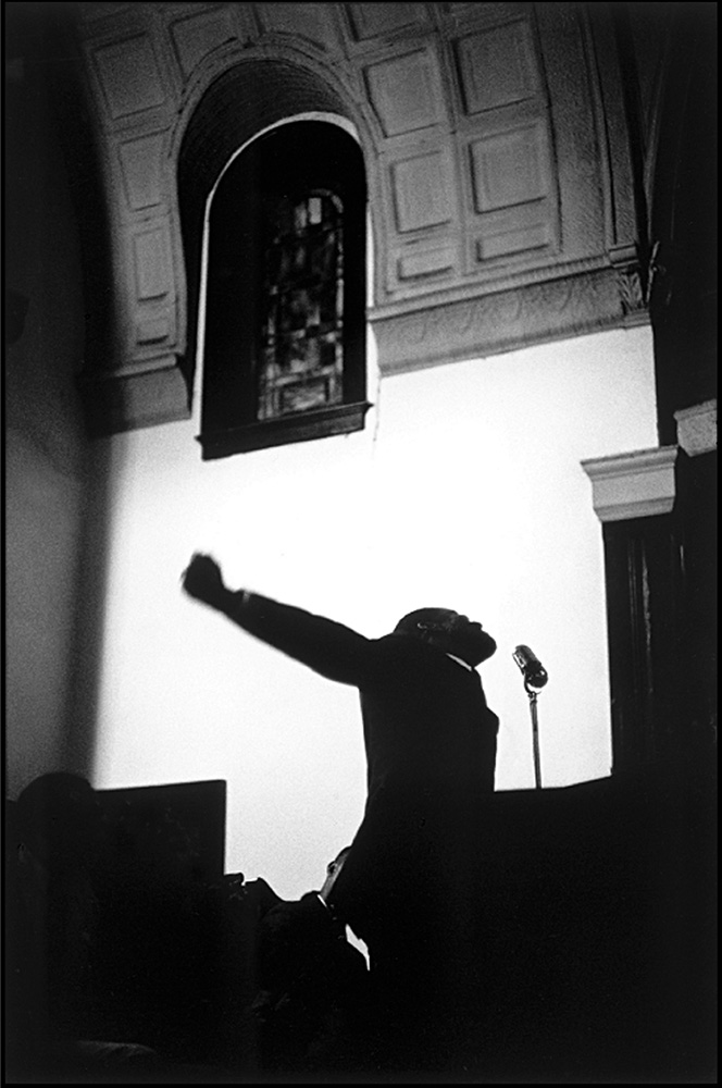 thumbnail of Rev. Fred Shuttesworth eulogizing Jimmie Lee Jackson, killed by an Alabama state trooper, Brown Chapel AME church by Dan Budnik. medium: silver gelatin print. date: March, 1965. dimensions: 17.75 x 11.875 inches
